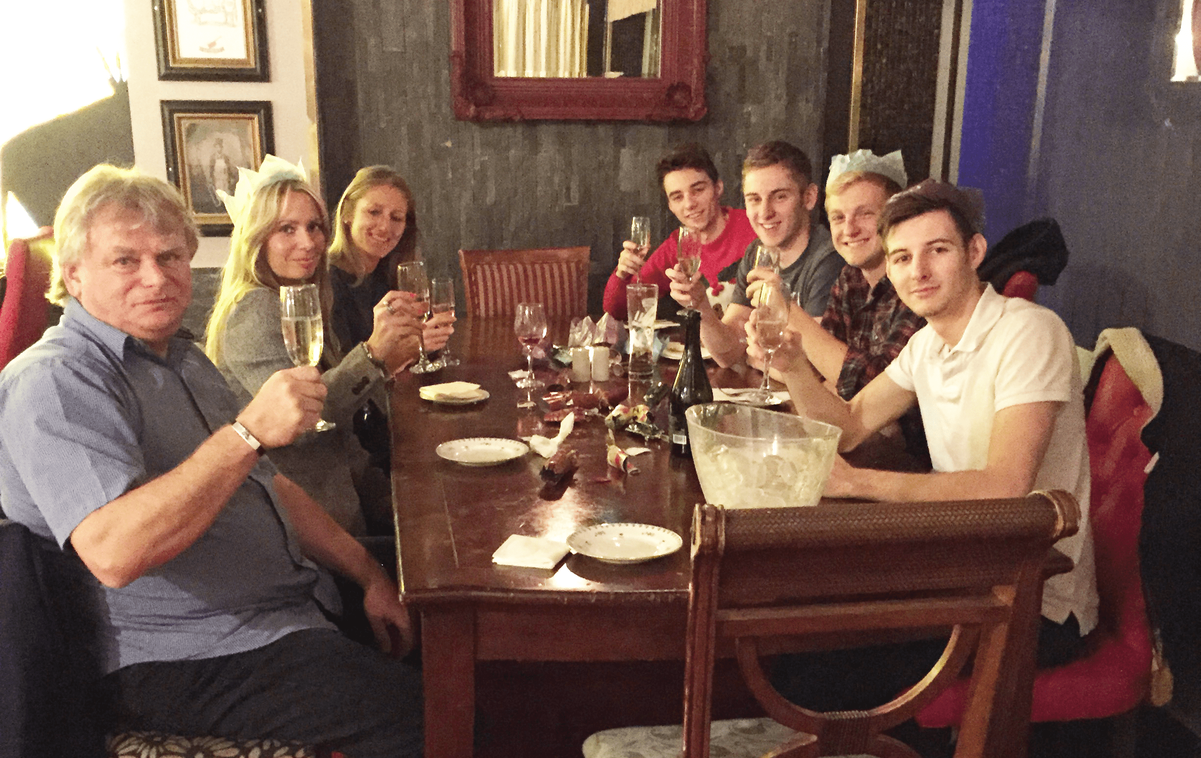Team photo at bar for Christmas drinks