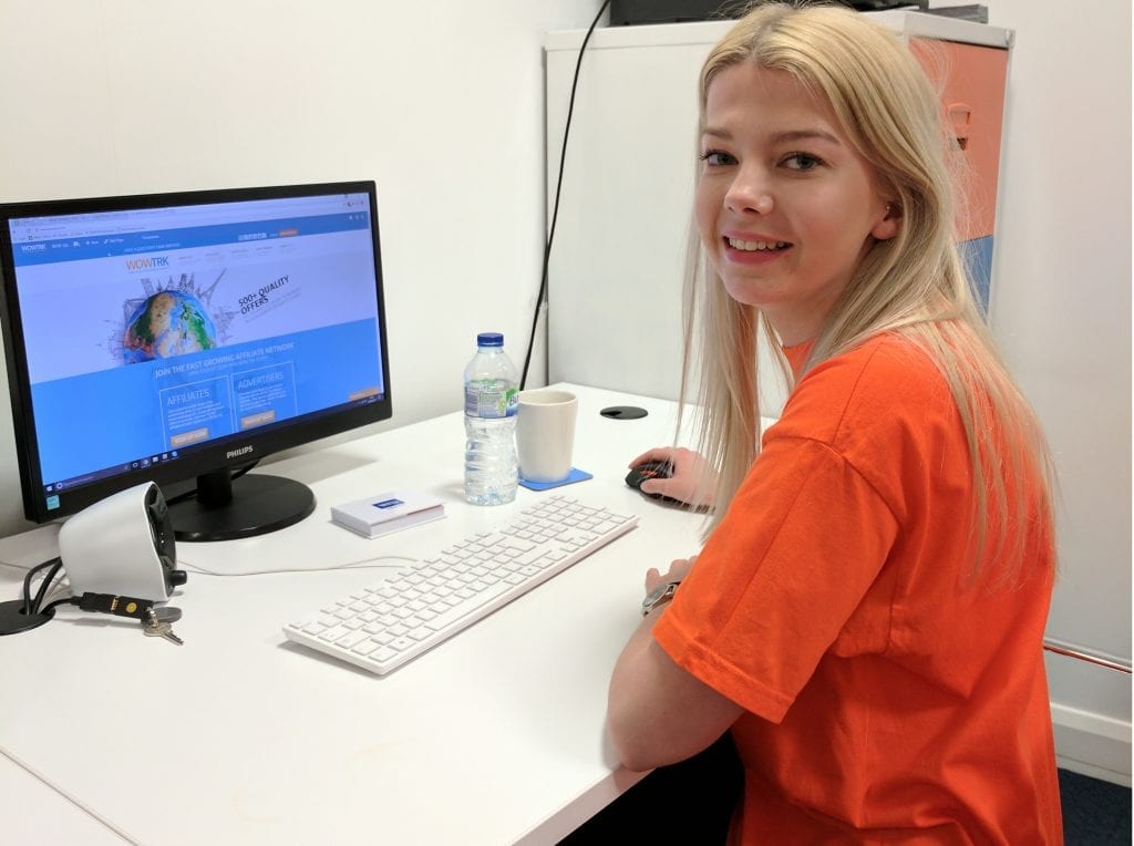 Photo of Nicole in the WOW Media office