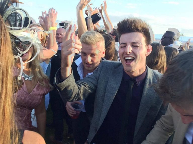 Reece Mallett singing at Southwell Races