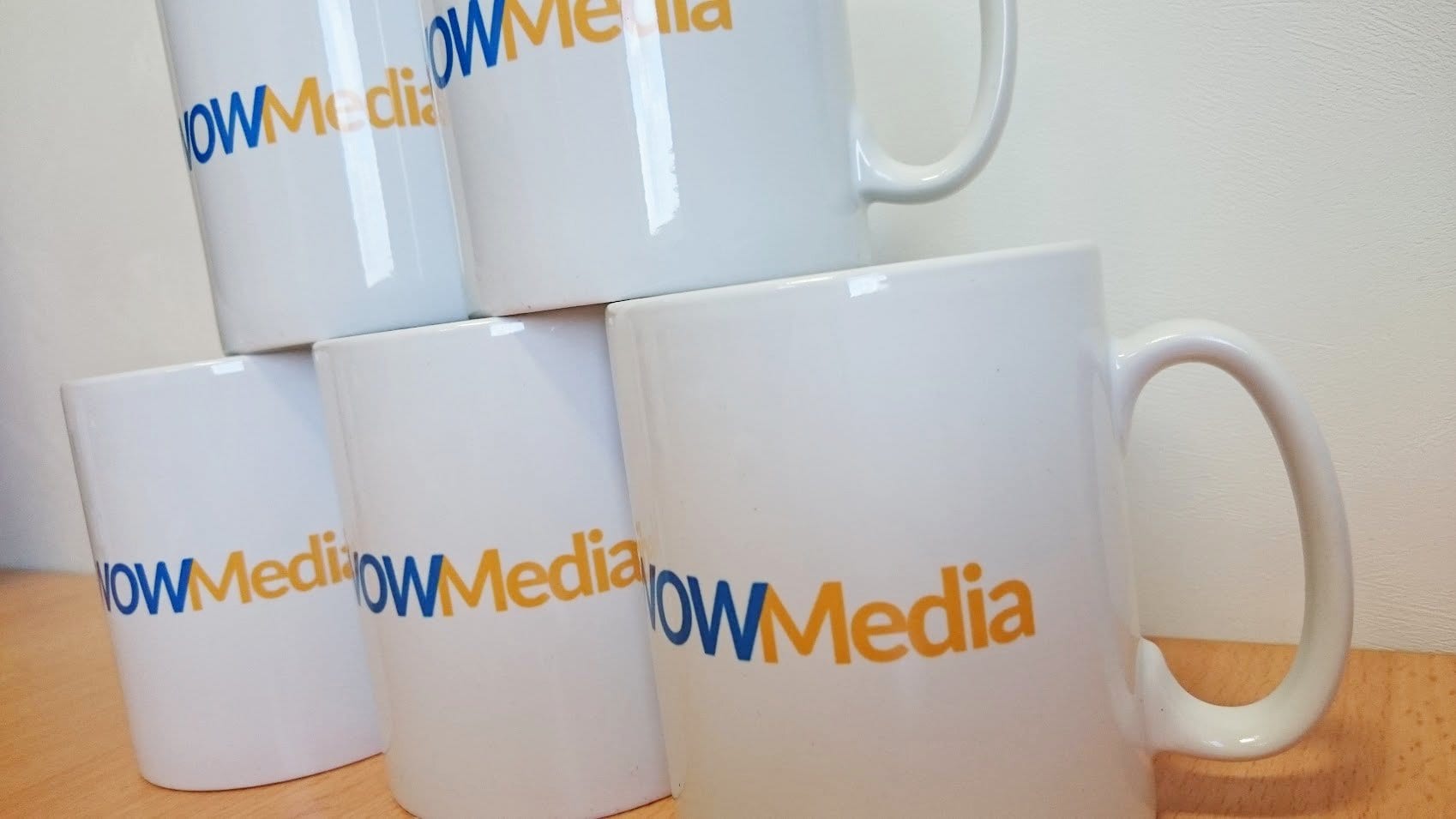 WOW Media branded mugs